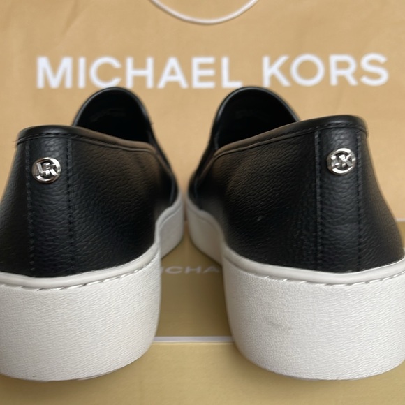Michael Kors TEDDI SLIP ON
TUMBLED FAUX LTHR
49T2TEFP1L
Black 
Platform Sneakers - Picture 13 of 16